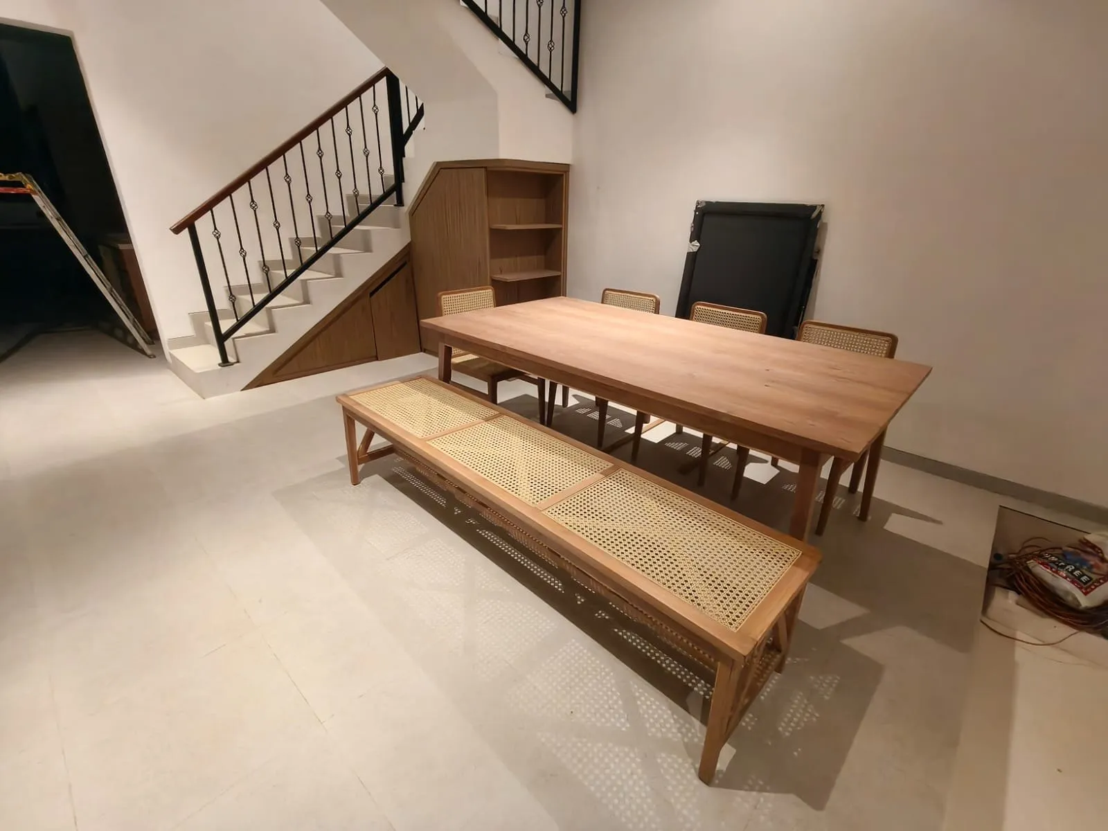 Teak dining table with a bench.