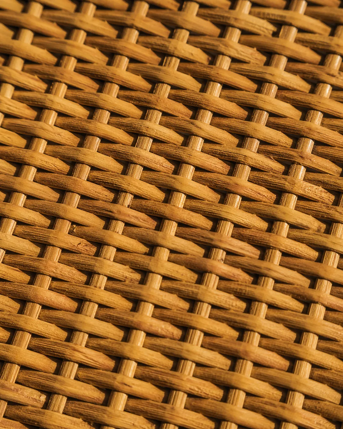 Natural rattan weaving detail showing core and peel rattan craftsmanship