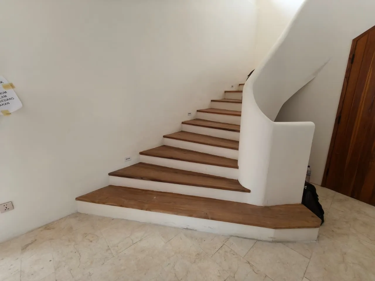 Staircase with teak treads.